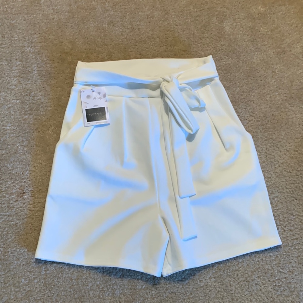 Brand new, never used, white high waisted shorts.